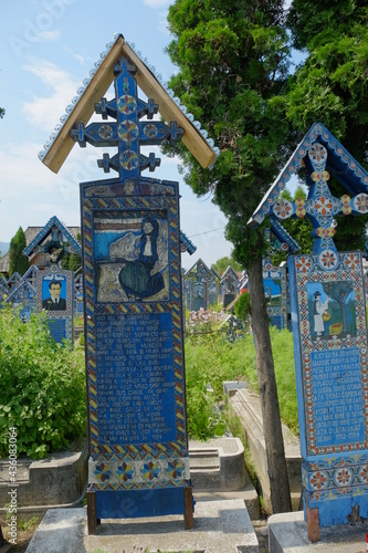The Merry Cemetery is a cemetery in the village of Sapanta, Maramures county, Romania. In the Merry Cemetery, grave markers celebrate life with beautiful images and gentle wit.