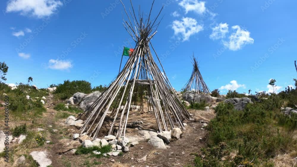 The Patio das Cabanas (Huts Courtyard) in Vila Cha, Esposende, Portugal. Wooden stick hut house, looking like Indian tepee with a beautiful panorama view towards the Portuguese coastline. The Patio das Cabanas (Huts Courtyard) in Vila Cha, Esposende, Portugal. Wooden stick hut house, looking like Indian tepee with a beautiful panorama view towards the Portuguese coastline.