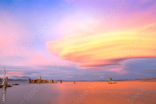 Fantastic colors over Mono Lake with lenticular clouds moving over it at twilight