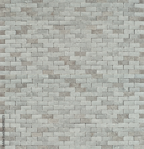 Gray bricks close up. Texture of concrete wall. Fence made of concrete blocks.