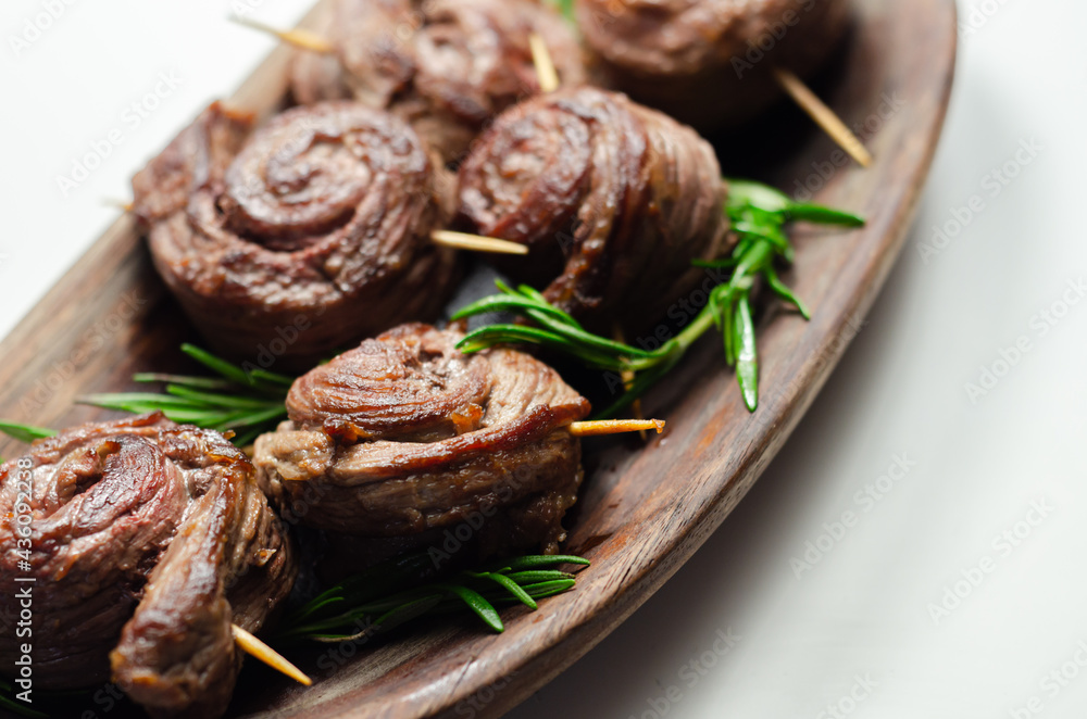 Juicy beef, fried and cooked in the shape of a rose, creatively served meat Juicy beef, fried and cooked in the shape of a rose, creatively served meat