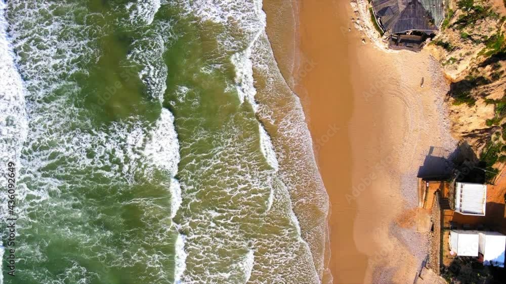 Aerial Forward Shot Of Waves Rushing Towards Coastline On Beach During Sunny Day, Drone Flying Over Ocean - Herzliya, Israel Aerial Forward Shot Of Waves Rushing Towards Coastline On Beach During Sunny Day, Drone Flying Over Ocean - Herzliya, Israel
