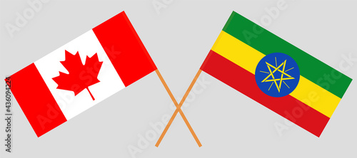 Crossed flags of Canada and Ethiopia. Official colors. Correct proportion