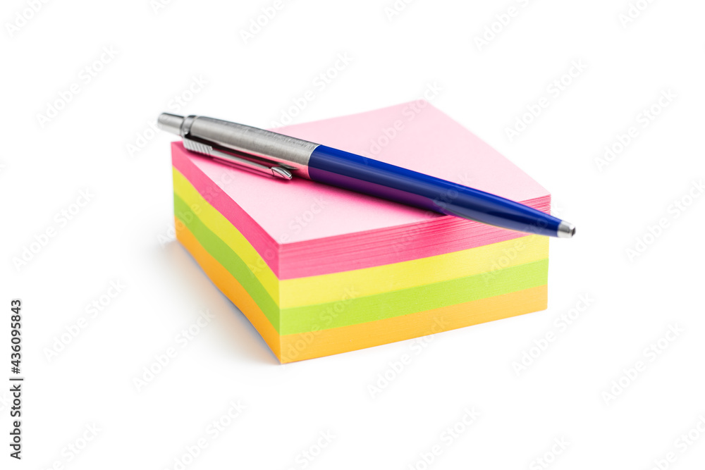 Blank sticky paper notepad and pen. Blank sticky paper notepad and pen.