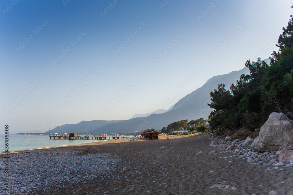 Beach on the sea with mountains in the background in Antalya Kemer