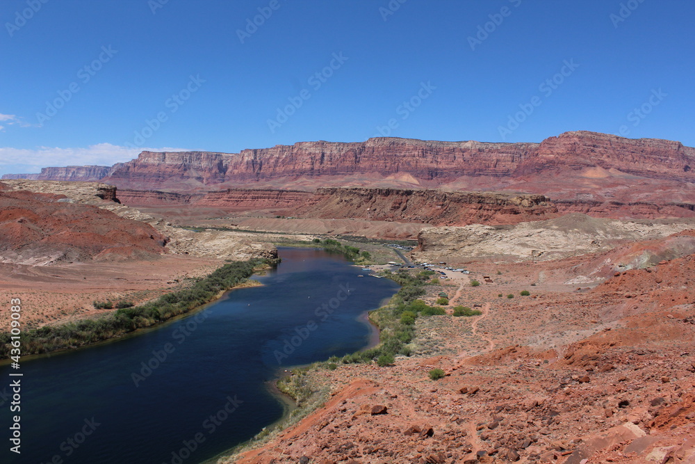 Marble Canyon near Lee Ferry's entrance along the Colorado River showing a series of massive colorful sandstone cliffs 