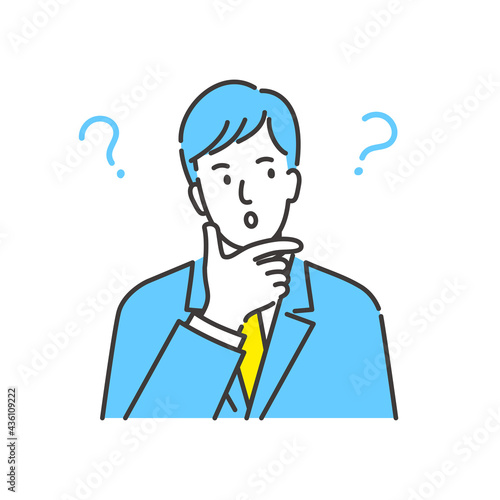考え中で顎に手をあてるスーツ姿の若いビジネスマンのベクターイラスト