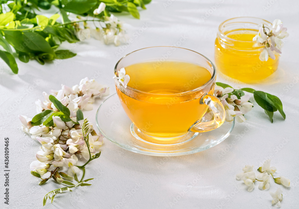 Acacia tea on white background, selective focus