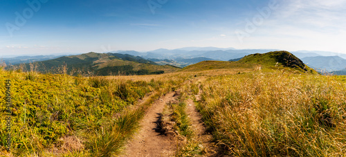 Panorama from the Rozsypaniec summit to the peaks of Tarnica, Halicz, Bukowe Berdko, Krzemien, Polonina Carynska, Kopa Bukowska, Bieszczady Mountains, Wołosate photo