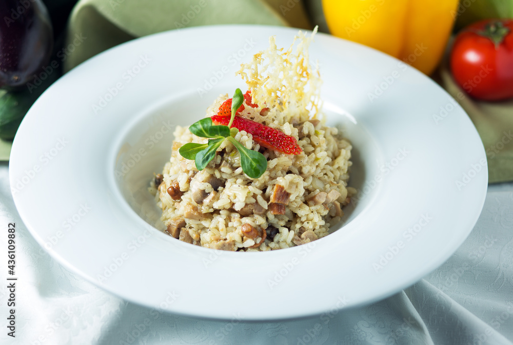 Delicious risotto with mushrooms and meat Delicious risotto with mushrooms and meat