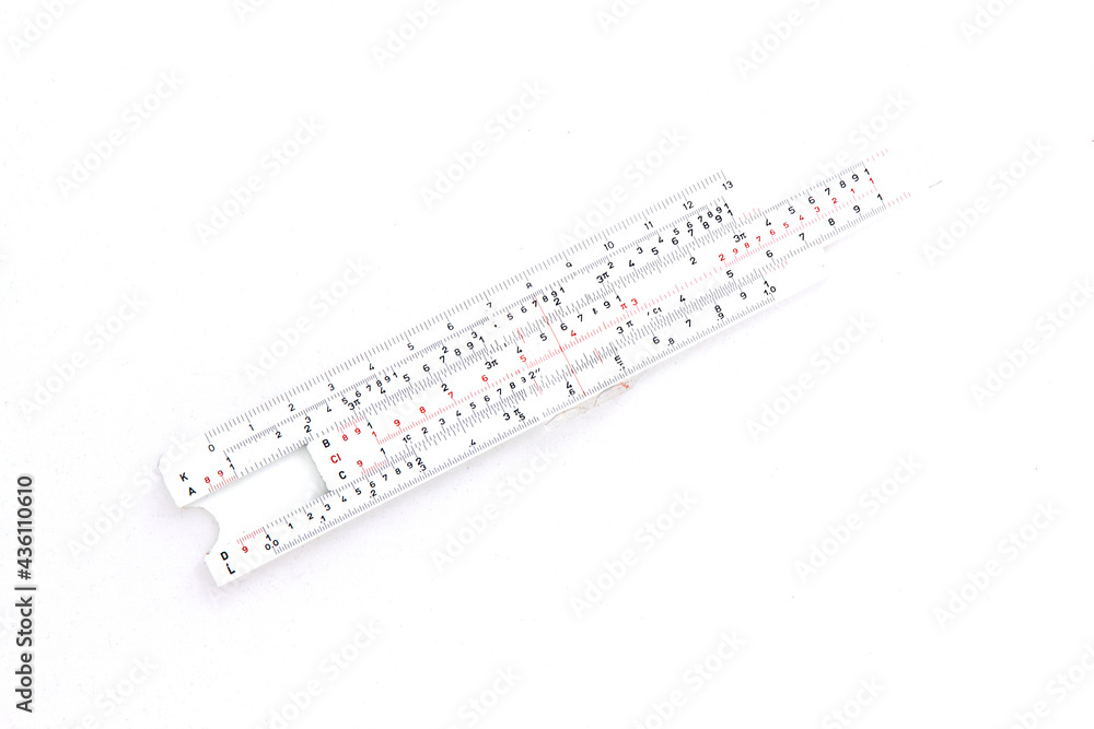 Logarithm ruler isolated on white background mechanical calculator isolated. Logarithm ruler isolated on white background mechanical calculator isolated.