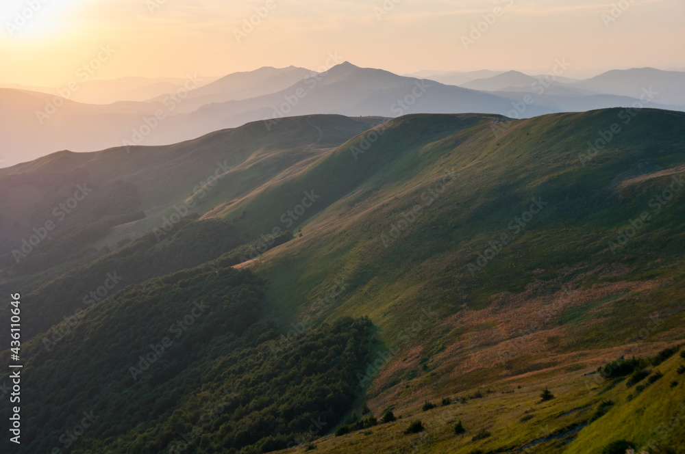 Panorama from the top of Tarnica to the peaks of Szeroki Wierch, Połonina Caryńska, Wetlińska and Wielka Rawka, the highest peaks of the Bieszczady Mountains, sunset of the Bieszczady Mountains, 