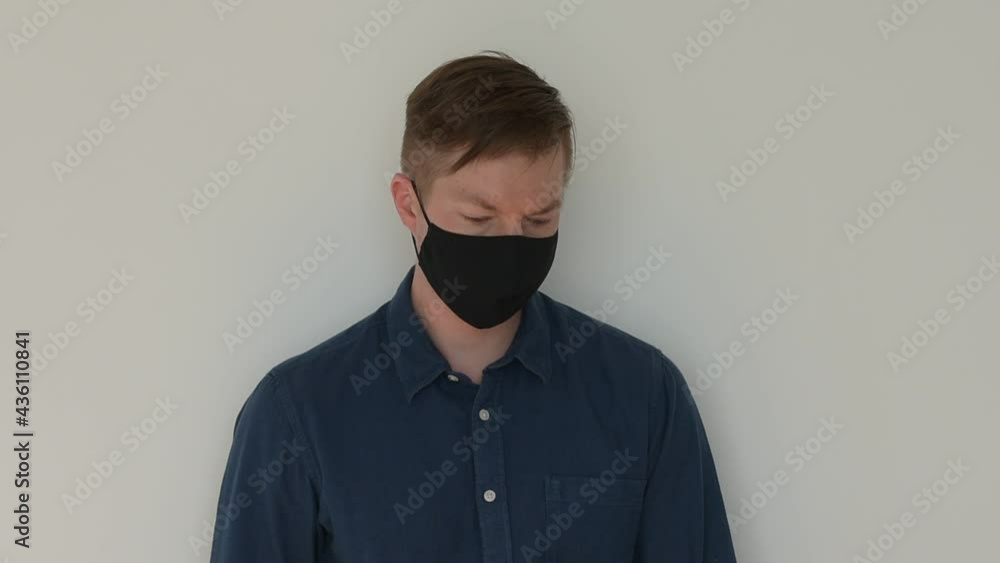 Portrait of frustrated and sad man wearing face mask Portrait of frustrated and sad man wearing face mask