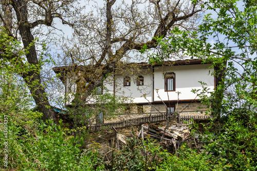 Typical street and old houses at historical village of Bozhentsi, Bulgaria