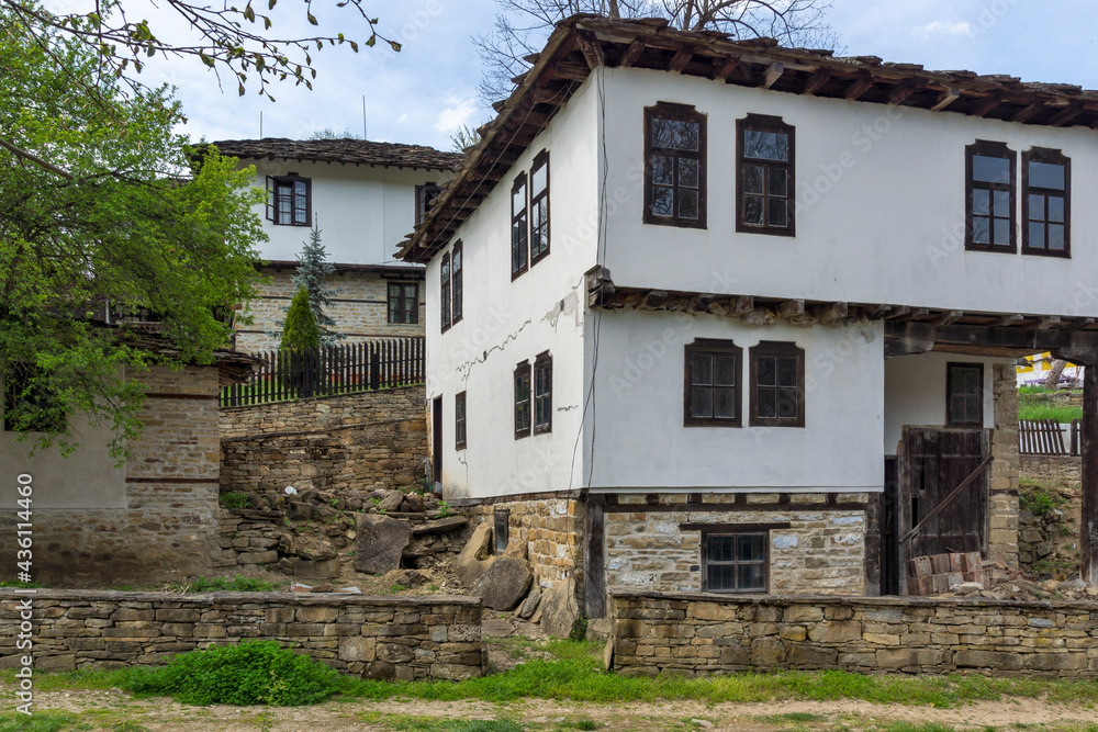 Typical street and old houses at historical village of Bozhentsi, Bulgaria