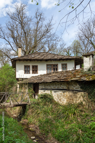 Typical street and old houses at historical village of Bozhentsi, Bulgaria