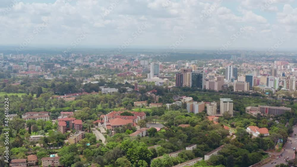 Aerial view of Nairobi cityscape Kenya. Downtown downtown with skyscraper streets with traffic and park in the city. Aerial view of Nairobi cityscape Kenya. Downtown downtown with skyscraper streets with traffic and park in the city.