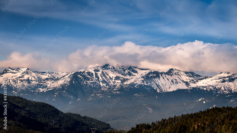 Cloud blanket hanging over the mountains just north of Whistler in the Garibaldi Mountain Range of British Columbia, Canada