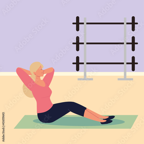 girl doing sit ups at gym