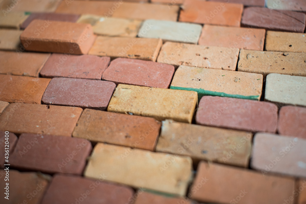 Fototapeta premium Closeup of a background with some red bricks making a wall texture
