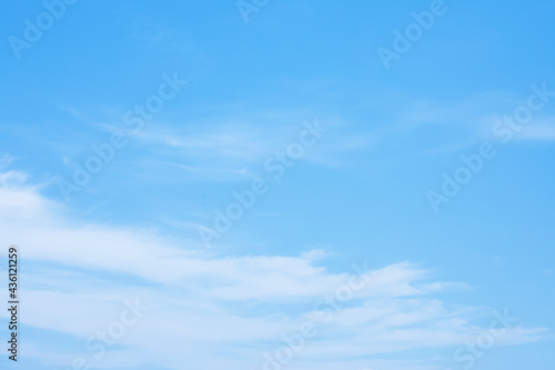 Fototapeta Naklejka Na Ścianę i Meble -  Blue sky background and white clouds soft focus, and copy space horizontal shape
