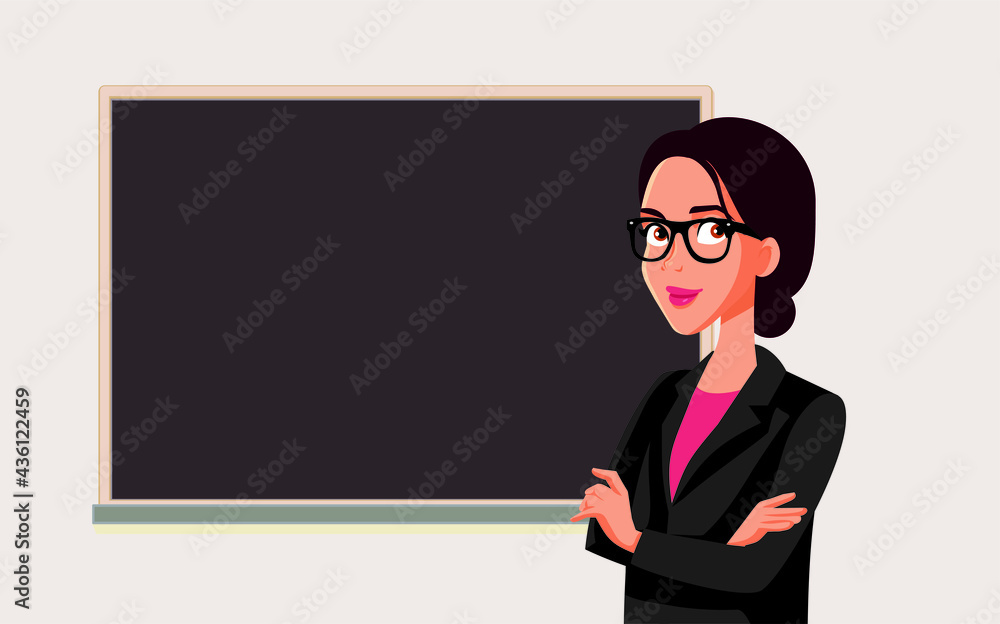 Teacher Standing in Front of a Blackboard in Class Teacher Standing in Front of a Blackboard in Class