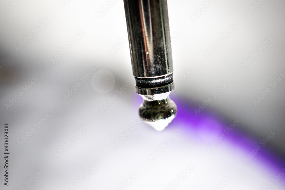 Macro Closeup of Tip on Worn Out Quarter Inch Jack with Opposite End of Cord in Background Macro Closeup of Tip on Worn Out Quarter Inch Jack with Opposite End of Cord in Background