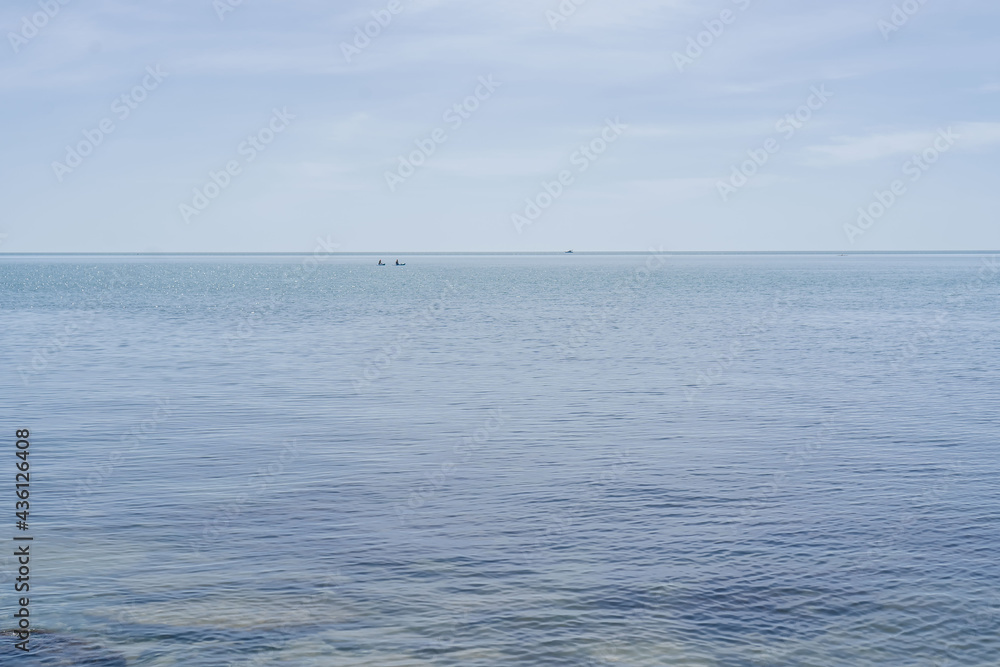 Beautiful sea and sky landscape in blue tones. Beautiful sea and sky landscape in blue tones.