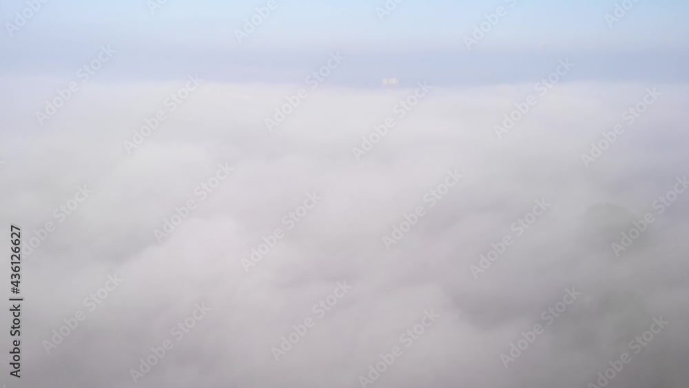 Dense Fog Covering The River In Zwijndrecht Town In Western Netherlands. close up Dense Fog Covering The River In Zwijndrecht Town In Western Netherlands. close up