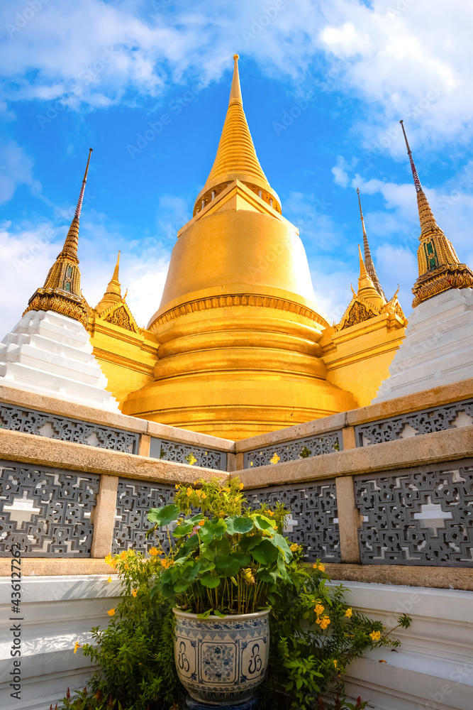 Fototapeta premium Wat Phra Kaew is a sacred temple and it's a part of the Thai grand palace, the Temple that houses an ancient Emerald Buddha