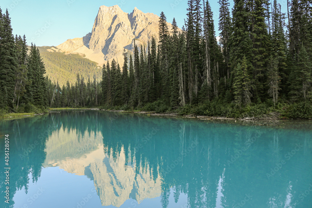 Emerald Lake with reflections of trees and mountain, Yoho National Park, Canada