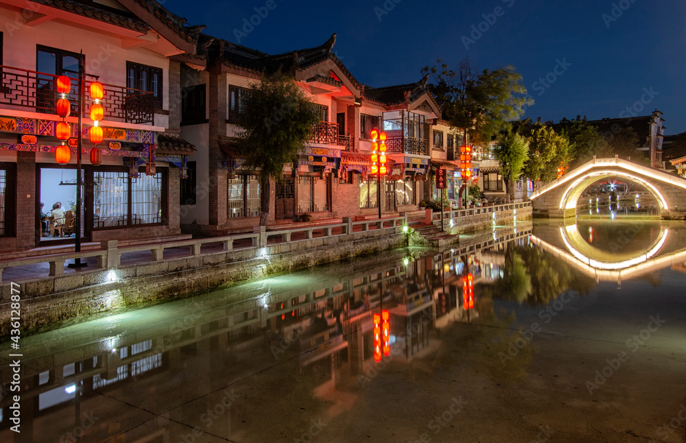 Night view of Yi Ren Ancient Town in Chuqionx near Kunming, in Yunnan - China