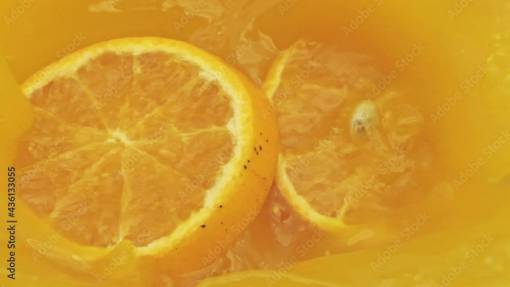 Pour the orange juice from the pitcher into a glass of water. Orange juice is rich in vitamin C, good for breakfast.
