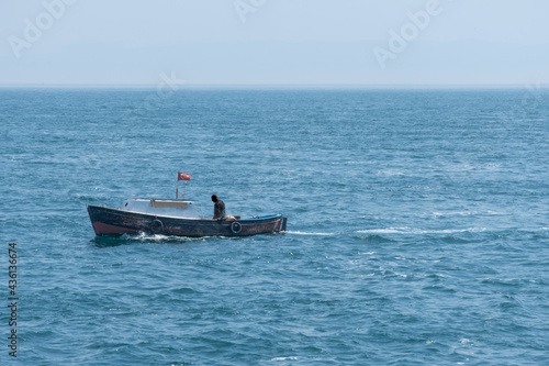 small fishing boat in the sea and fisherman, yacht,