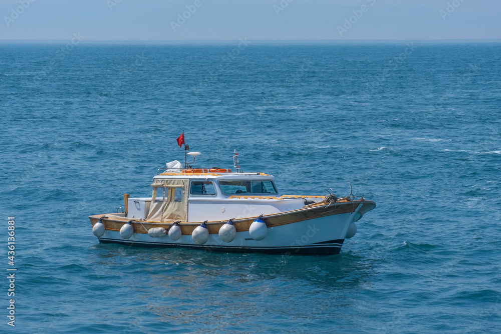 small fishing boat in the sea and fisherman, yacht,