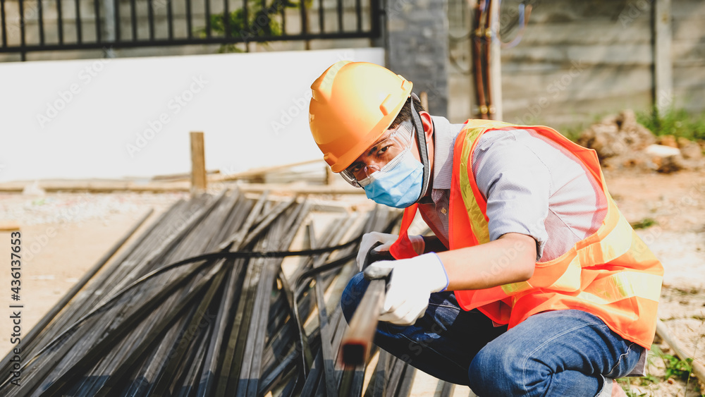 Engineer contractor man work safety industry project, check investigating the size and quality of steel used in building construction structures site Engineer contractor man work safety industry project, check investigating the size and quality of steel used in building construction structures site