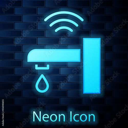 Glowing neon Smart water tap system icon isolated on brick wall background. Internet of things concept with wireless connection. Vector