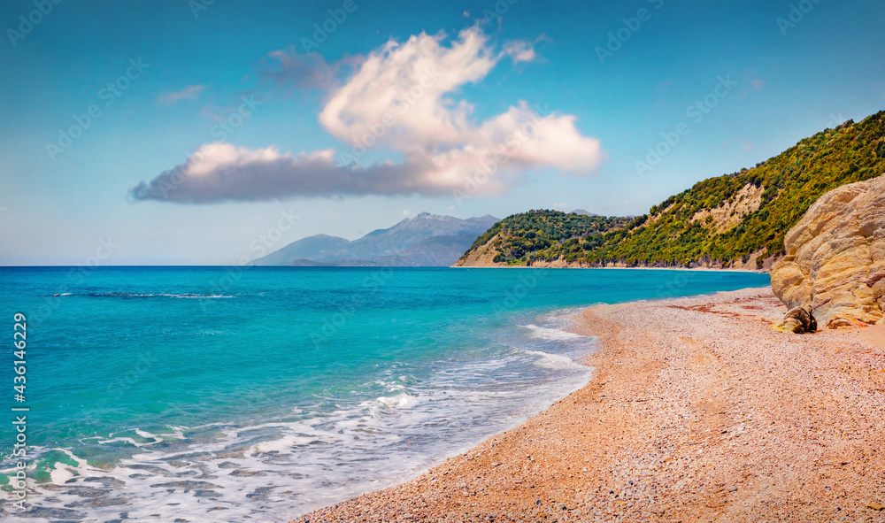 Sunny spring view of empty Lukove beach. Adorable seascape of Adriatic sea. Wonderfuloutdoor scene of Albania, Europe. Beauty of nature concept background.
