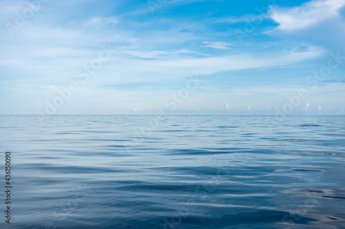 Calm Sea and Blue Sky Background. © satit