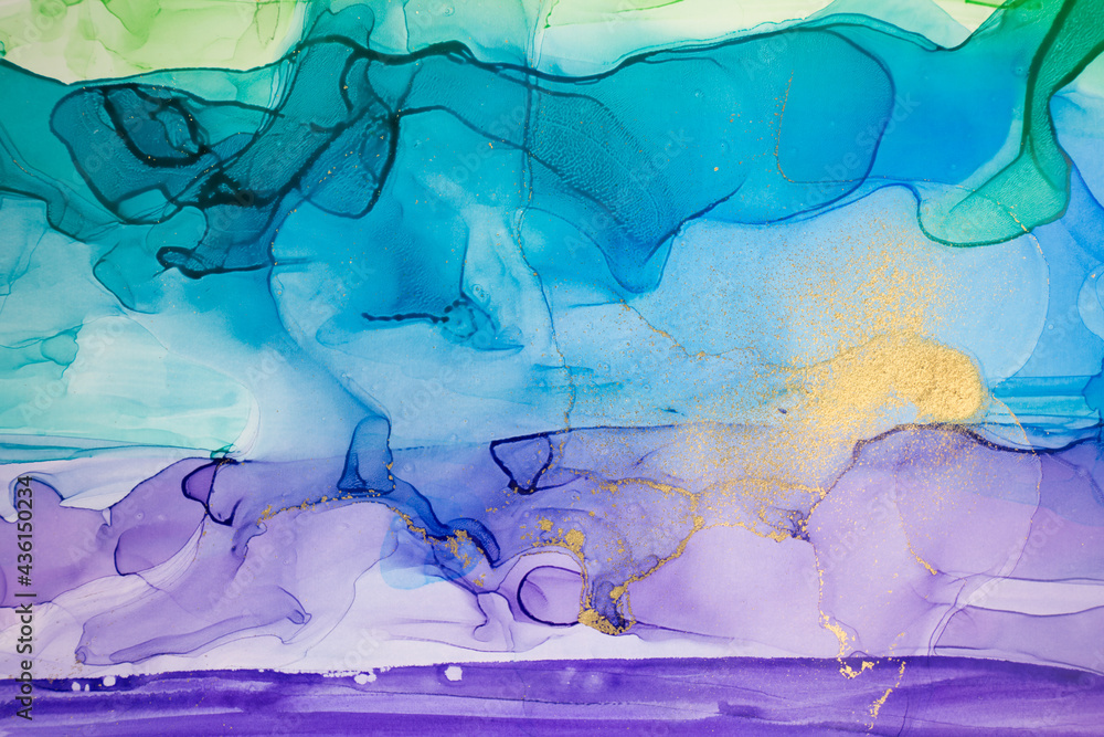 Watercolor blue and purple abstract gradient pattern with gold dust.