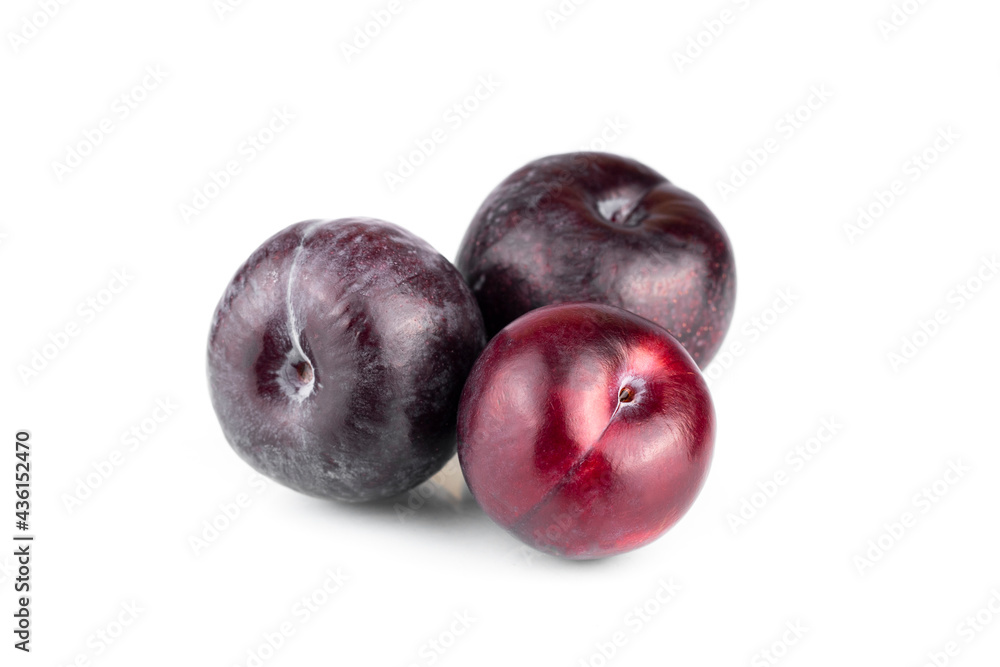 Obraz premium Plums. Ripe natural and organic plums isolated on white background. Purple cherry plums. Part of set.