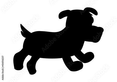 A cute little black dog walking outside with black shadow