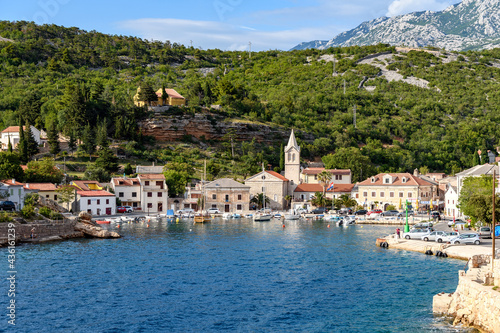 Idyllic old town of Jablanac in bay on coast of adriatic sea in Croatia. photo