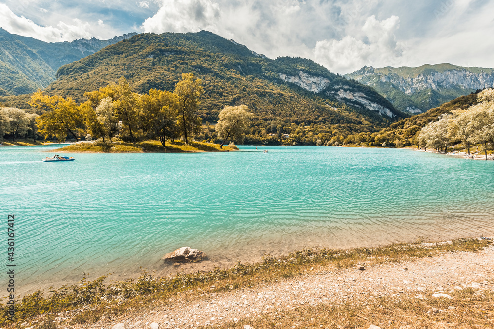 Lago di Tenno, lake in mountains. Summer in Italy