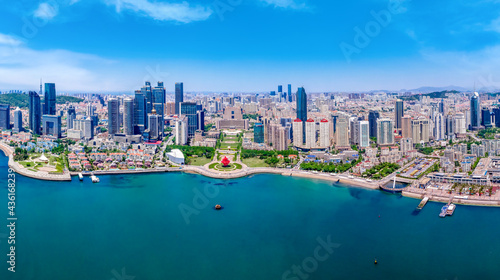 Aerial photography of architectural landscape skyline along Qingdao urban coastline © 昊 周