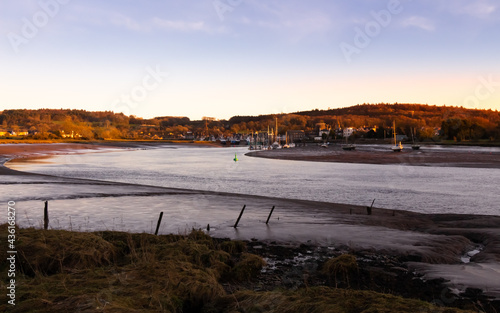 Winter sunset over the River Dee estuary at low tide at Kirkcudbright Harbour
