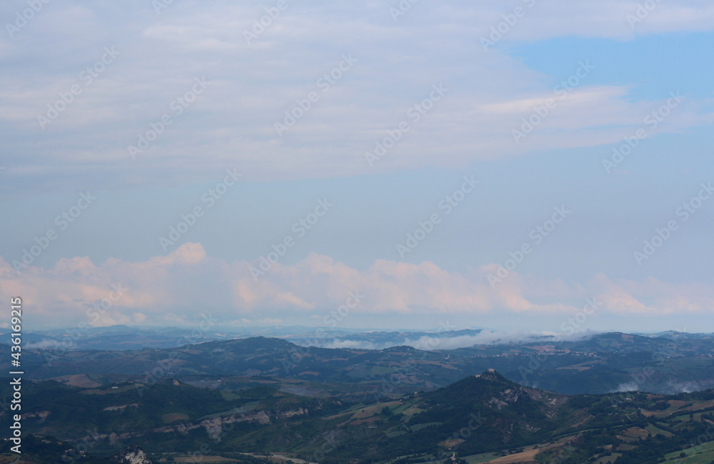 Beautiful landscape with mountainous terrain and cloudy skies. Panoramic view of Italy from San Marino