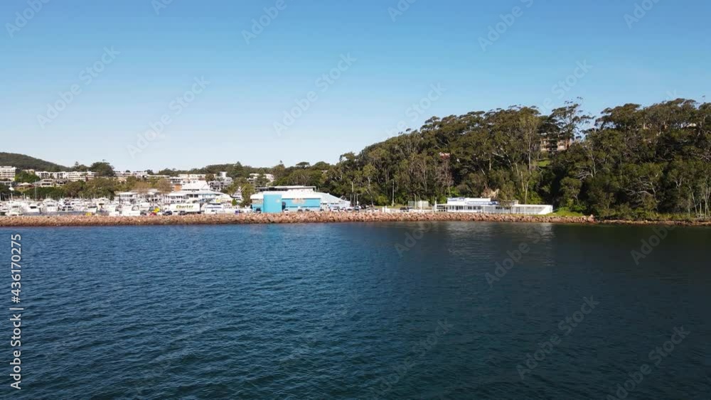 Fast revealing high view over water of a popular scuba diving spot the pipeline at Nelson Bay Port Stephens NSW Australia Fast revealing high view over water of a popular scuba diving spot the pipeline at Nelson Bay Port Stephens NSW Australia