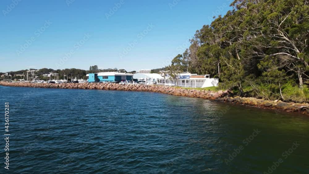 Fast revealing view over water of a popular scuba diving spot the pipeline at Nelson Bay Port Stephens NSW Australia Fast revealing view over water of a popular scuba diving spot the pipeline at Nelson Bay Port Stephens NSW Australia