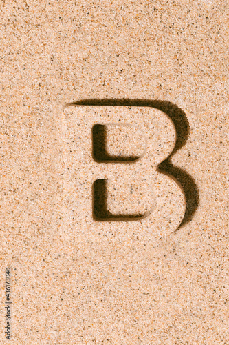 Letter B of the sand isolated on the beach sand. concept of summer. alphabet.